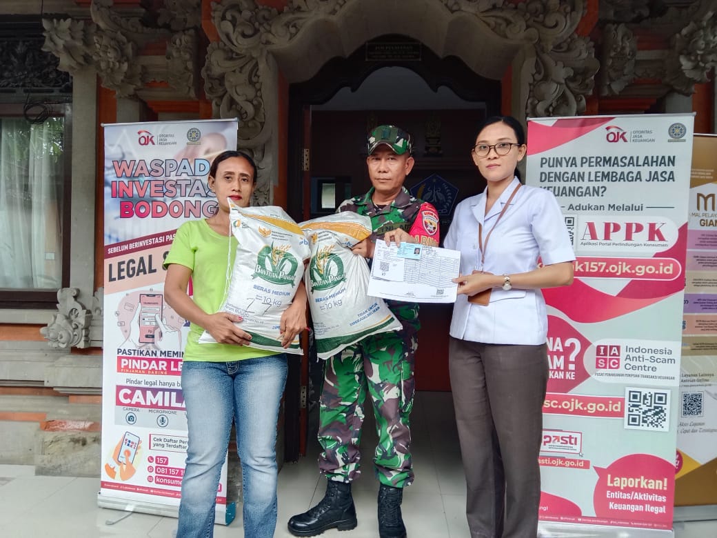 PENYERAHAN BANTUAN PANGAN KEPADA WARGA DESA PETULU TAHUN 2025